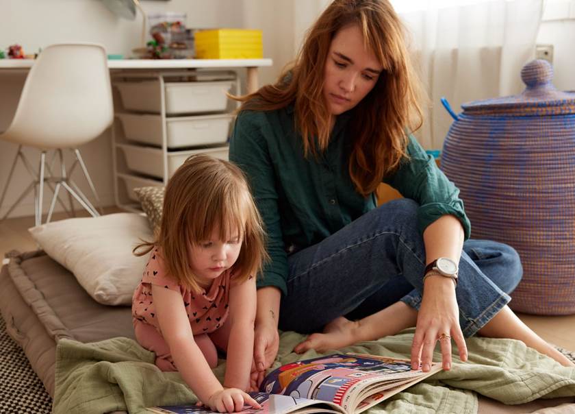 Mother and daughter reading