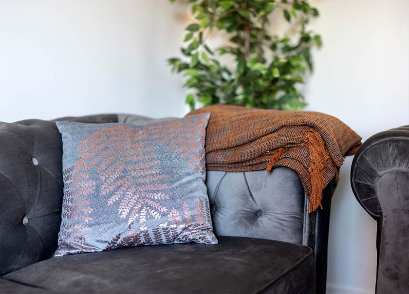 Close up image of sofa with cushions